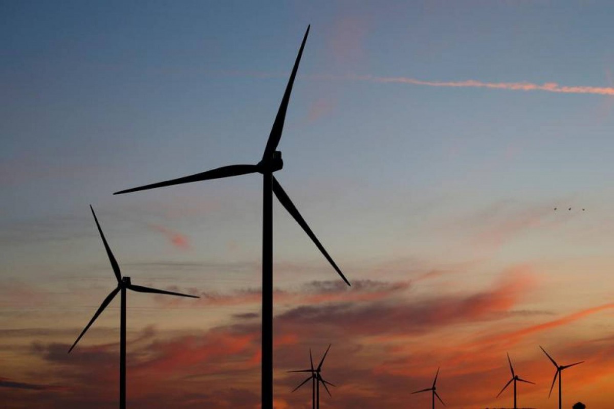 Power-generating windmill turbines at a wind park in Moeuvres near Cambrai, France, September 16, 2018. Reuters/Pascal Rossignol 