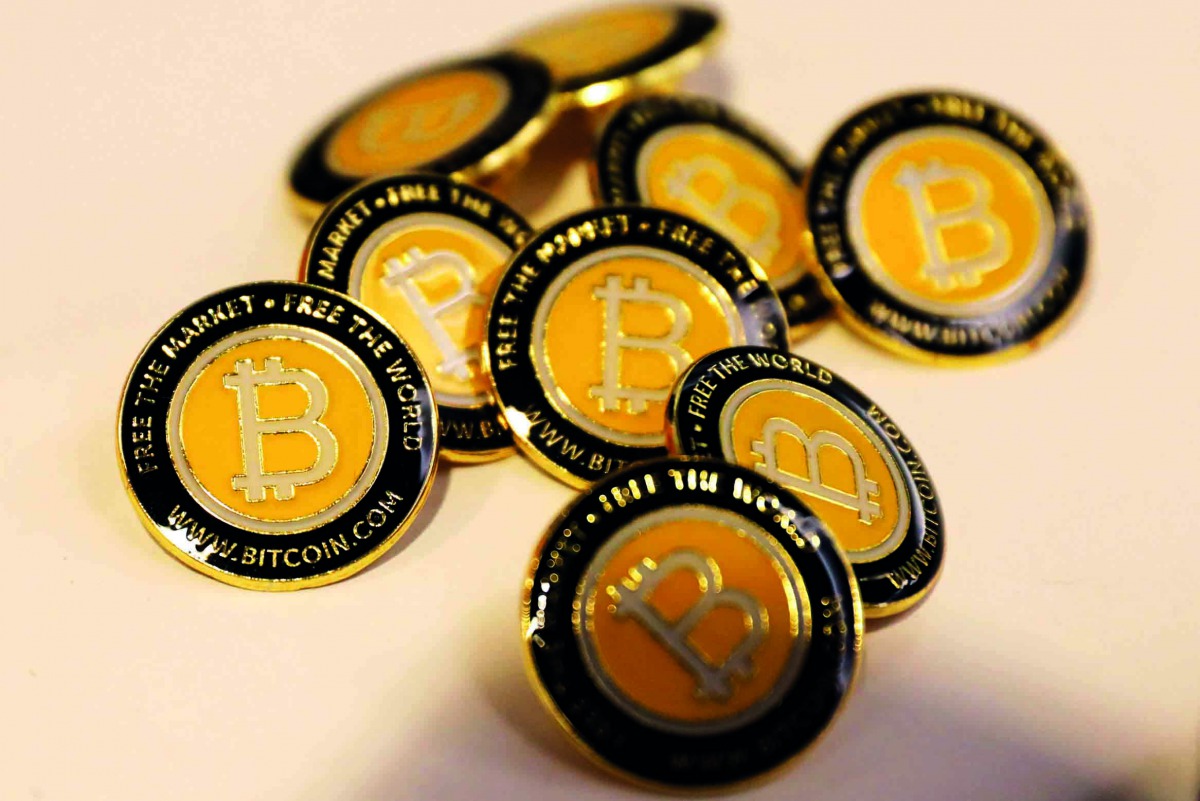 Bitcoin.com buttons are seen displayed on the floor of the Consensus 2018 blockchain technology conference in New York City, May 16, 2018. Reuters/Mike Segar 