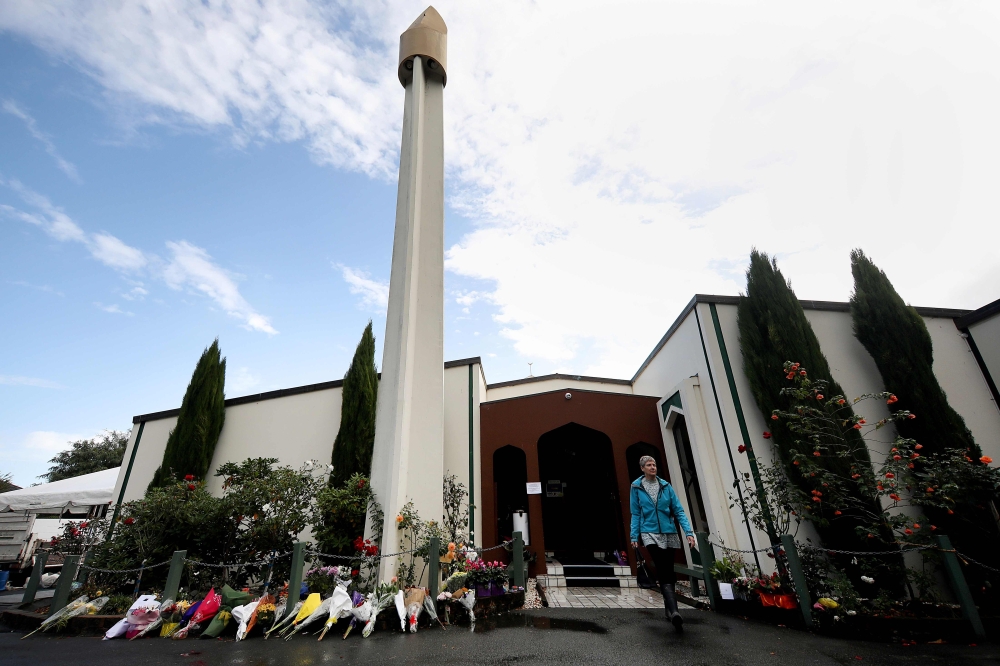 A visitor leaves the Al Noor mosque, one of the mosques where some 50 people were killed by a self-avowed white supremacist gunman on March 15, after mid-day prayers in Christchurch on April 5, 2019. AFP / Sanka Vidanagama 