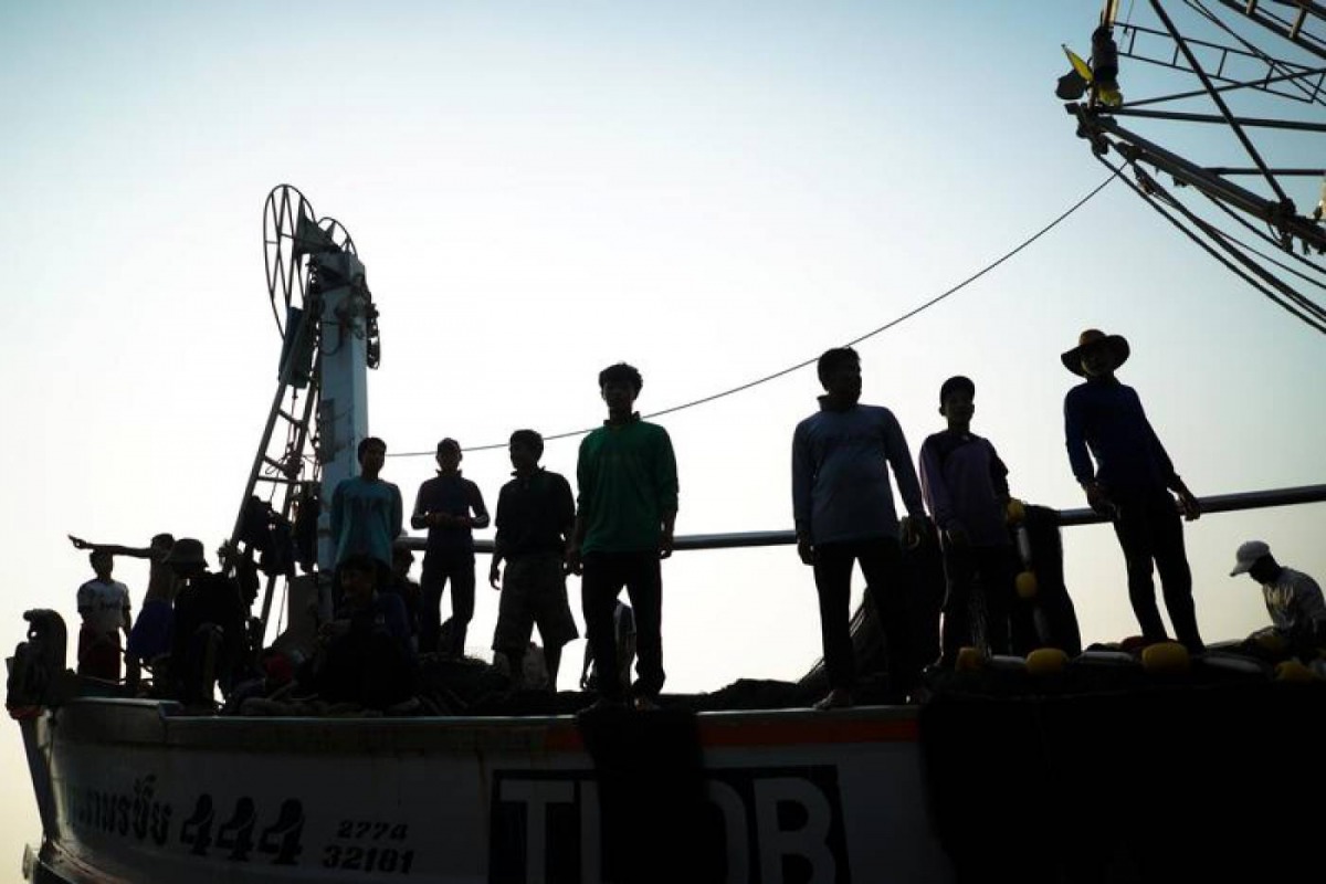 Migrant workers prepare to unload their catch at a port in Samut Sakhon province, Thailand, January 22, 2018. Reuters/Athit Perawongmetha