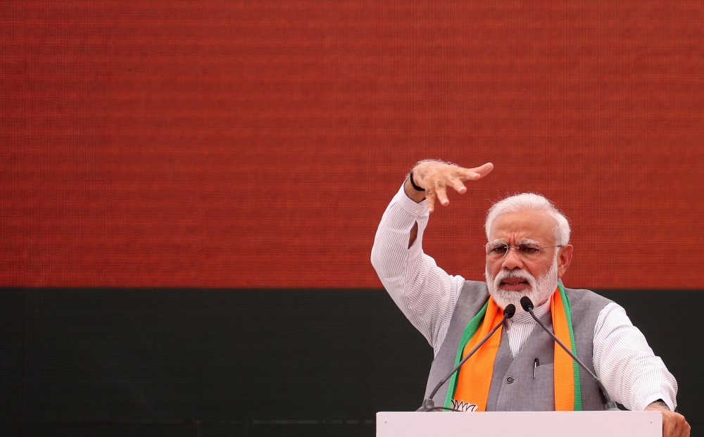 Indian Prime Minister Narendra Modi gestures at an event to present the Bharatiya Janata Party (BJP) election manifesto in New Delhi on April 8, 2019. AFP