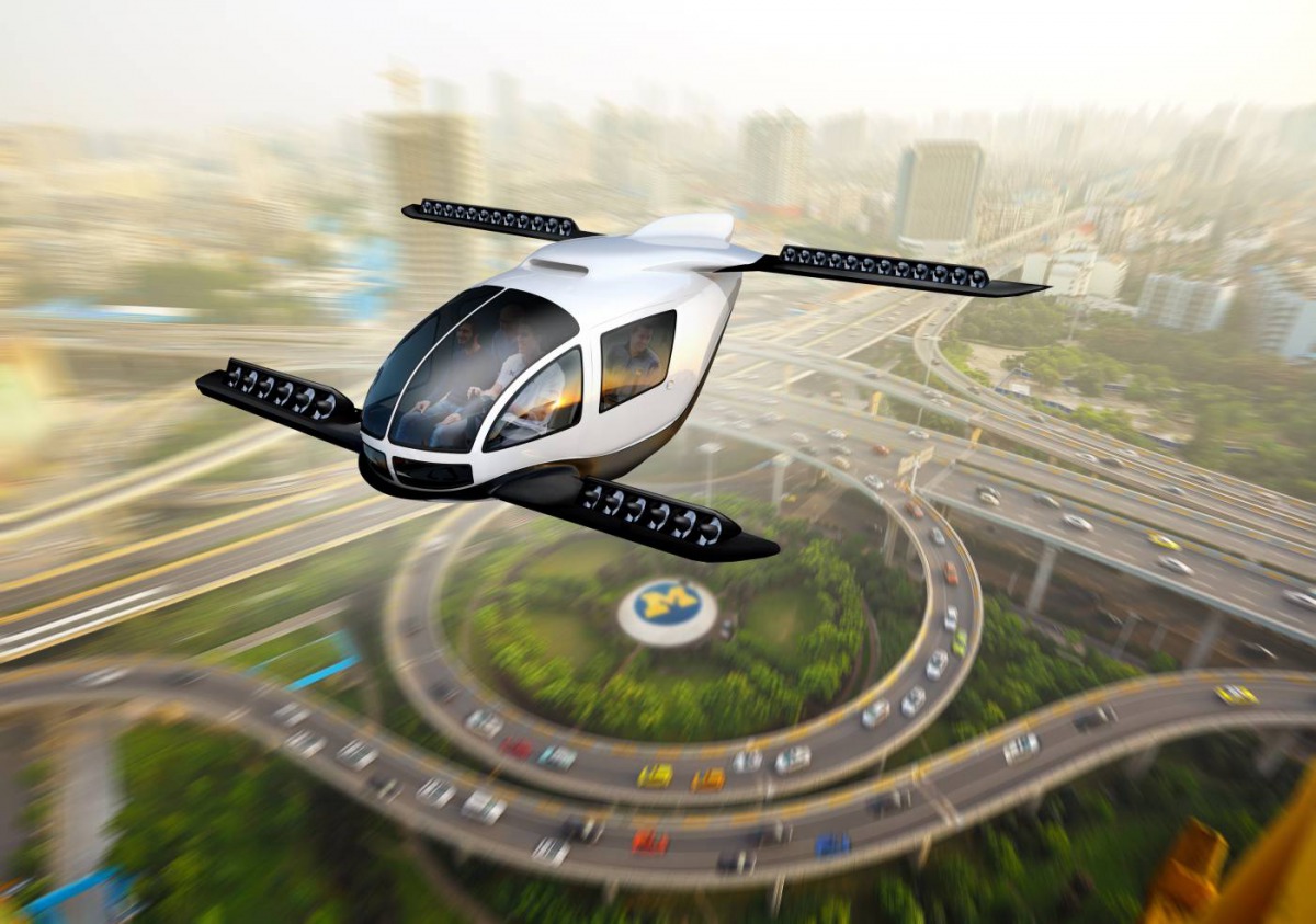 An artistic rendering of an electric vertical takeoff and landing taxi cruising through an urban center. Dave Brenner/University of Michigan School for Environment and Sustainability
