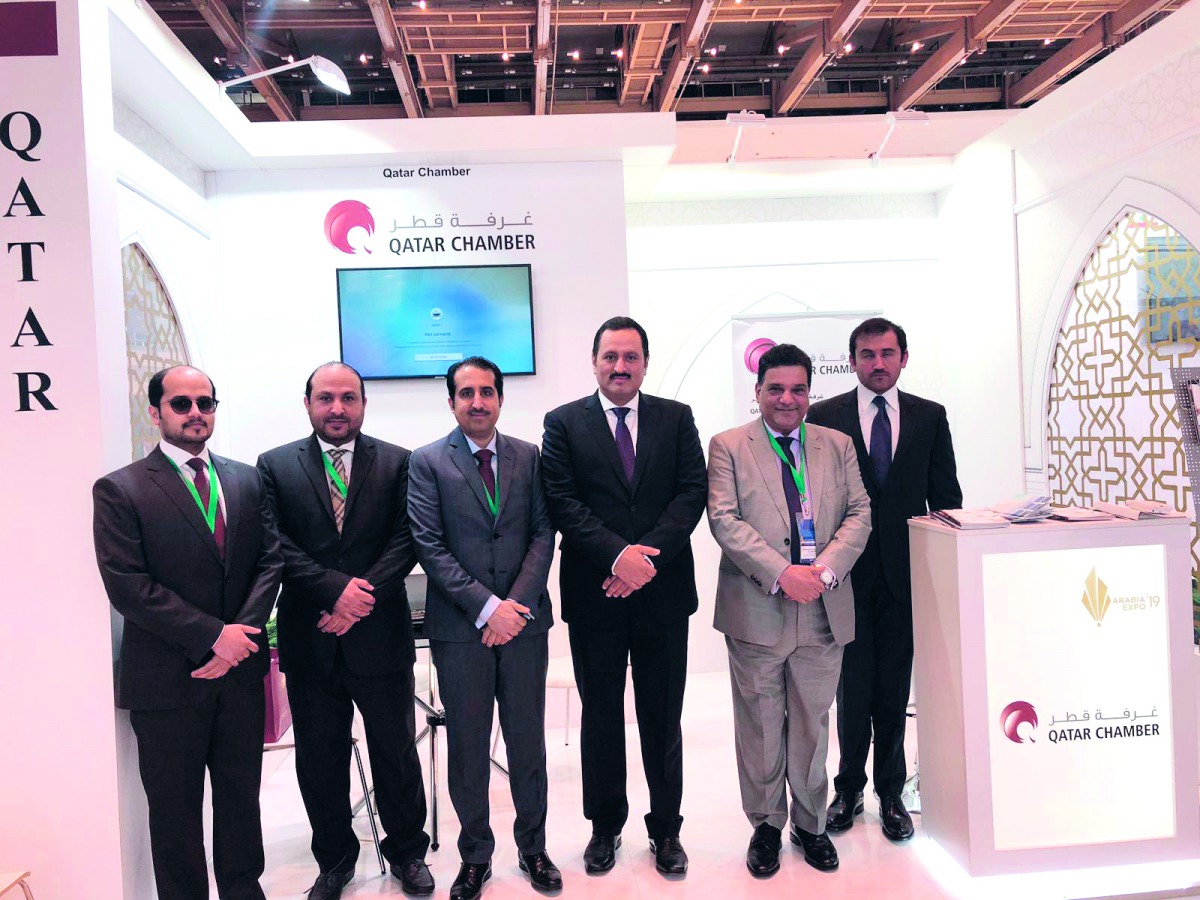The members of the Qatar’s trade delegation which included QC Board Member Mohamed bin Ahmed Al Obaidli, Director-General Saleh bin Hamad Al Shaqri, and Head of exhibition department, Layal Thabit, posing for a group photo at the QC pavilion at the expo i
