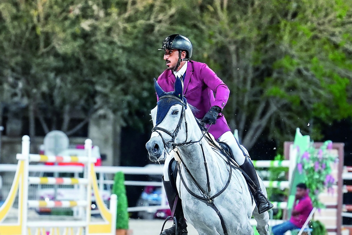 Qatari rider Jaber Rashid Al Amri rides  Canavaro De Muze E.T. during the Medium Tour competition on the opening day of the penultimate round of the Hathab Equestrian Tour - 2019, at the Qatar Equestrian Federation’s Arena, yesterday. 