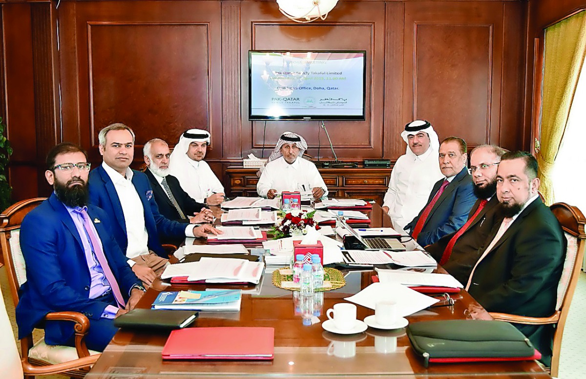 Sheikh Ali Abdullah Al Thani (centre), Chairman of Pak-Qatar Takaful Group,  Abdul Basit Ahmad Al Shaibei (fourth left); and other board members during the meeting.