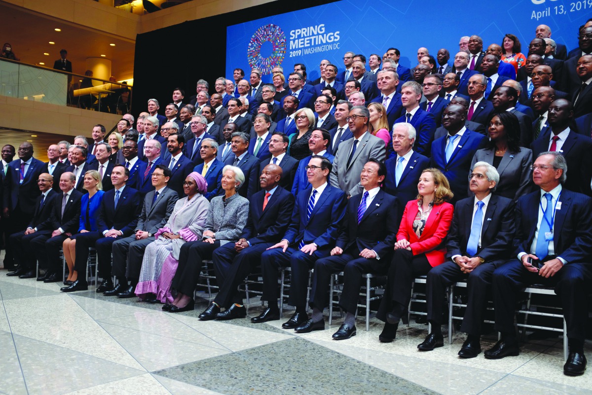 Central bank governors and other global finance officials sit for a group photo at the IMF and World Bank's 2019 Annual Spring Meetings, in Washington, April 13, 2019. Reuters/James Lawler Duggan