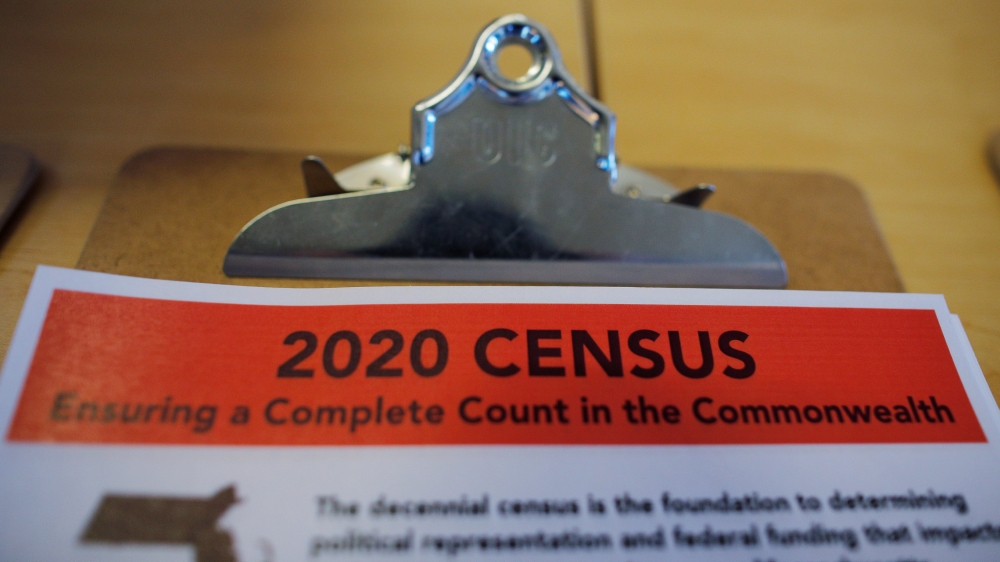 An informational pamphlet is displayed at an event for community activists and local government leaders to mark the one-year-out launch of the 2020 Census efforts in Boston, Massachusetts,  April 1, 2019. Reuters/Brian Snyder