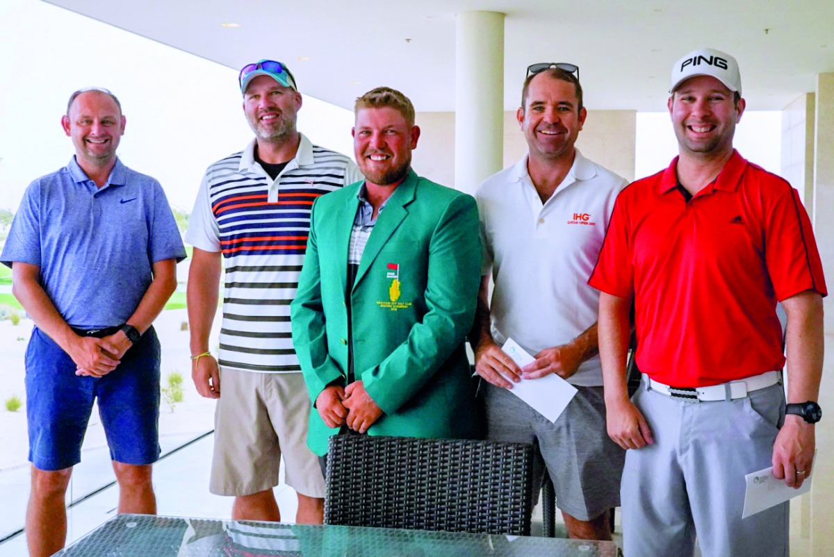 The podium winners at the Education City Golf Club Masters tournament pose for a picture during the victory ceremony at Education City Golf Club.  