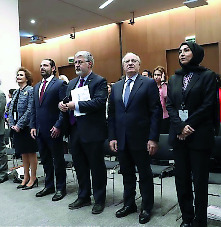 Prime Minister of Lebanon Saad Hariri (second left), and other participants.