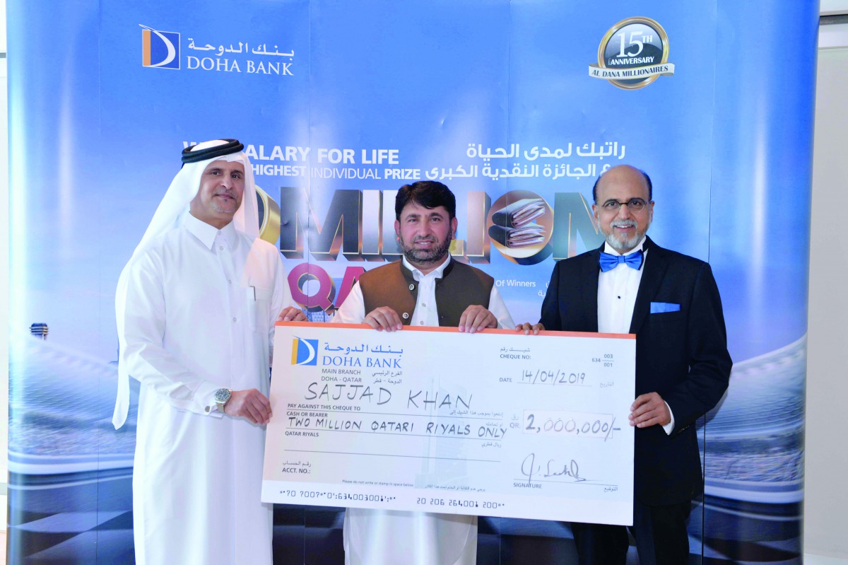 Dr R. Seetharaman, Group CEO of Doha Bank awarding a winner of Doha Bank’s Al Dana draw in Doha recently