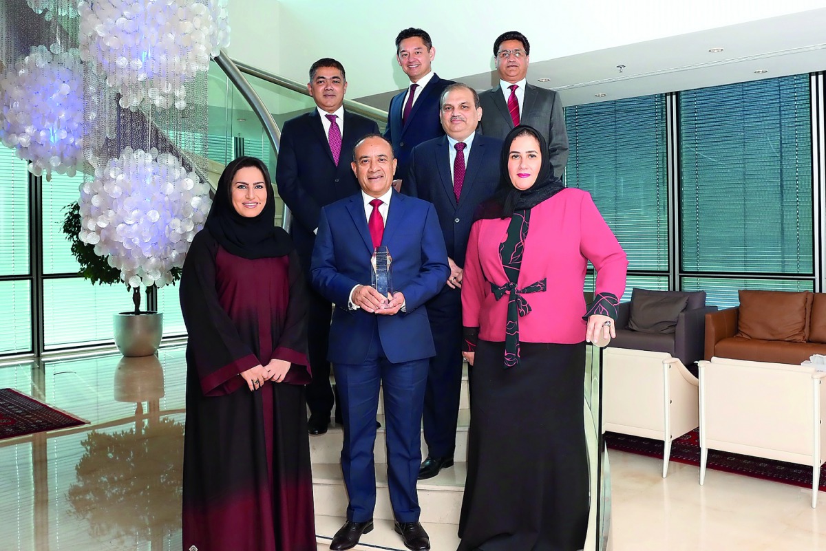 Commercial Bank Group CEO, Joseph Abraham (centre), with other officials.