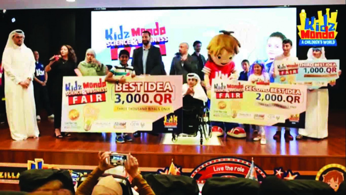 The officials with the winners at the annual Science & Business Fair.
