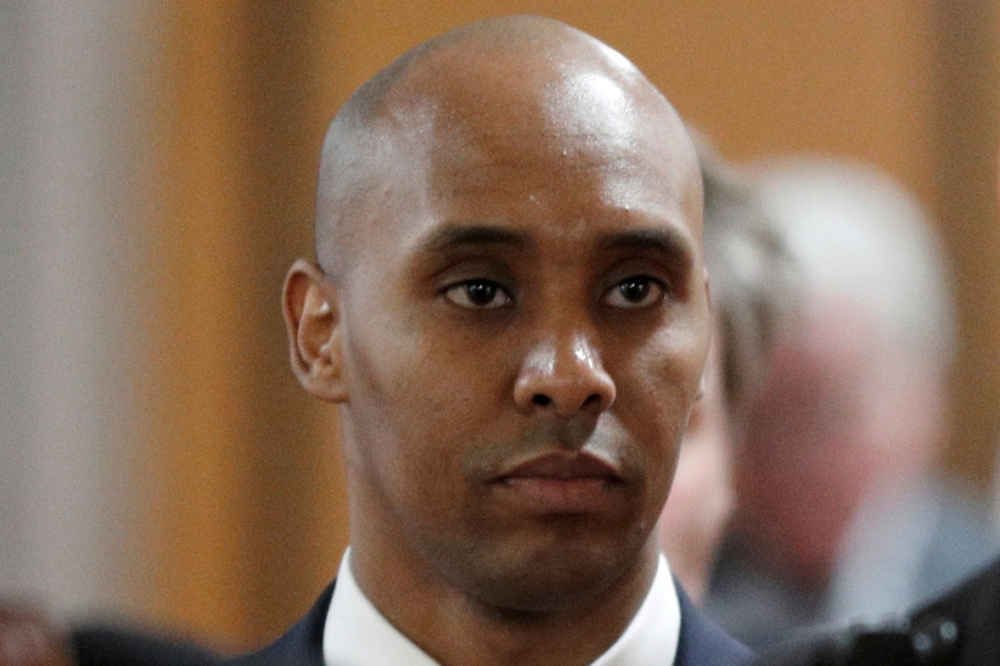 Former Minneapolis police officer Mohamed Noor walks out of the courthouse during a recess on the first day of opening arguments of his trial, where he is charged in the 2017 fatal shooting of 40-year-old Australian woman Justine Ruszczyk Damond, in Minne
