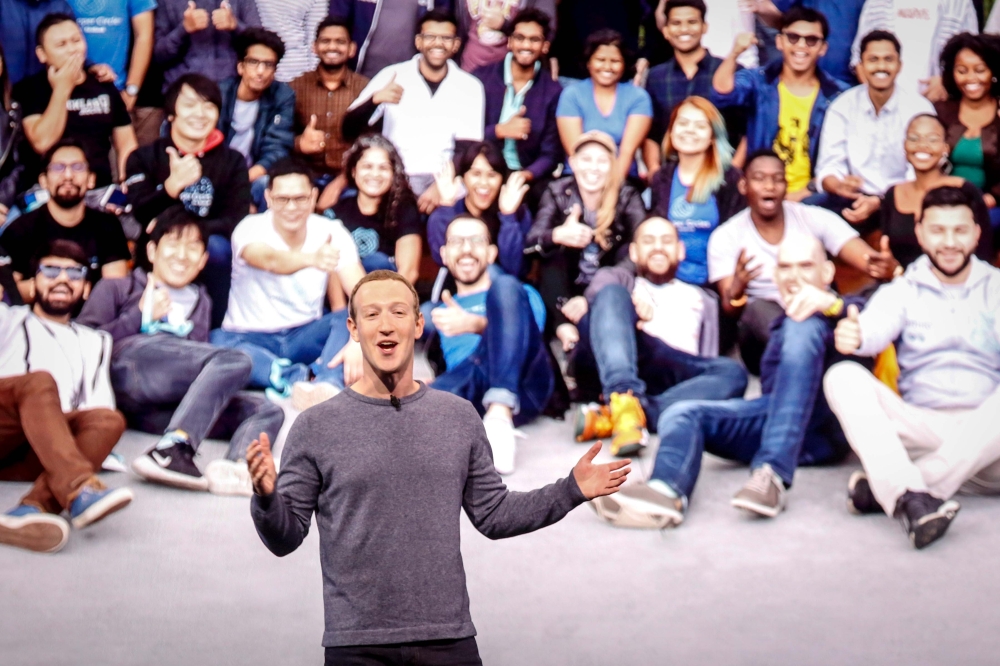 Facebook CEO Mark Zuckerberg delivers the opening keynote introducing new Facebook, Messenger, WhatsApp, and Instagram privacy features at the Facebook F8 Conference at McEnery Convention Center in San Jose, California on April 30, 2019.  AFP / Amy Osborn