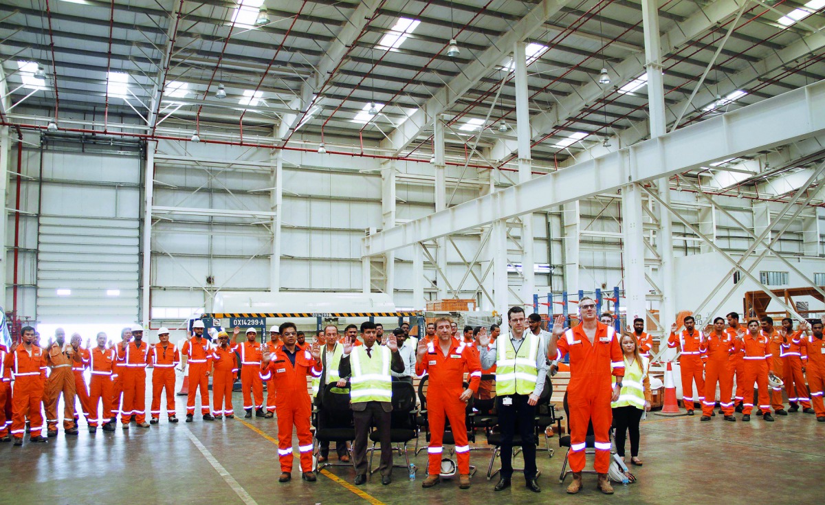 The officials, including Senior Manager RMO Project at Dolphin Energy, Fabrice Dalban, Logistics Manager at Total, Rajeswar Govindan, GWC Chief Operating Officer, Naji Nassar, Senior Director of Commercial Services at GWC, and other senior executives and 