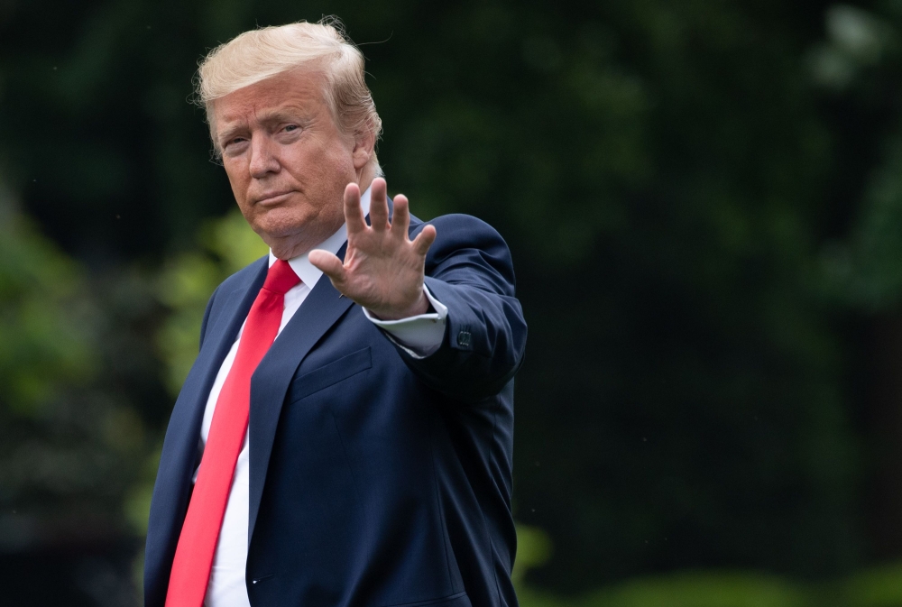 US President Donald Trump waves as he walks to Marine One prior to departing from the South Lawn of the White House in Washington, DC, May 8, 2019. (file photo / AFP / SAUL LOEB)