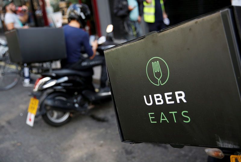 An UberEATS food delivery scooter is seen parked in London, September 7, 2016. Reuters/Neil Hall