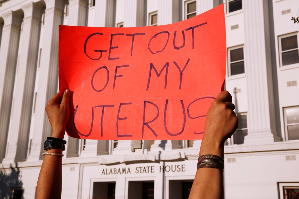Pro-choice supporters protest in front of the Alabama State House as Alabama state Senate votes on the strictest anti-abortion bill in the United States at the Alabama Legislature in Montgomery, Alabama, U.S. May 14, 2019. Reuters/Chris Aluka Berry