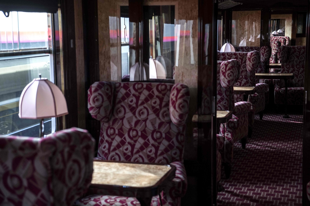 This picture taken on May 13, 2019 shows the interior of a newly-restored carriage of an Orient Express train at Gare de l'Est train station in Paris. AFP / Christophe Archambault
 
