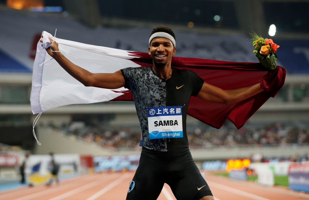 Qatar's Abderrahman Samba celebrates winning the Mens 400m Hurdles (REUTERS/Aly Song)
