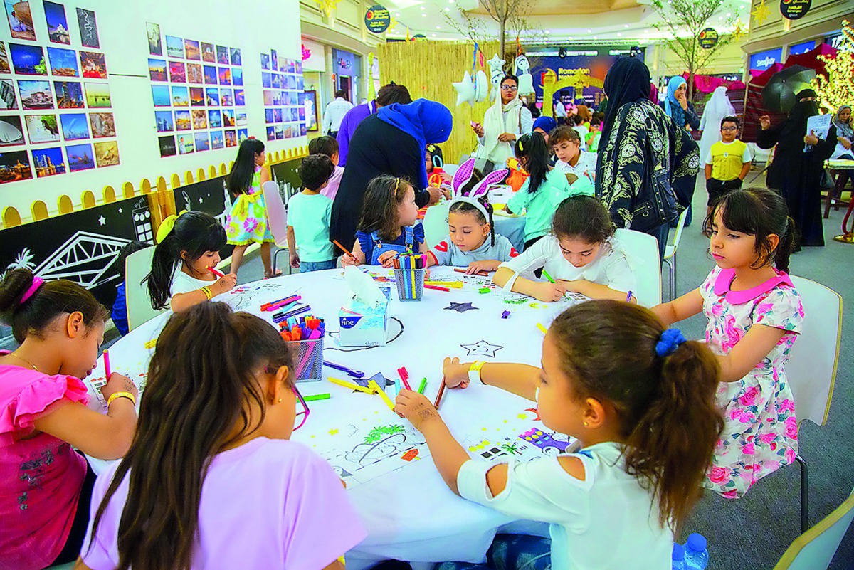 Children engaged in various activities at Hyatt Plaza Mall.