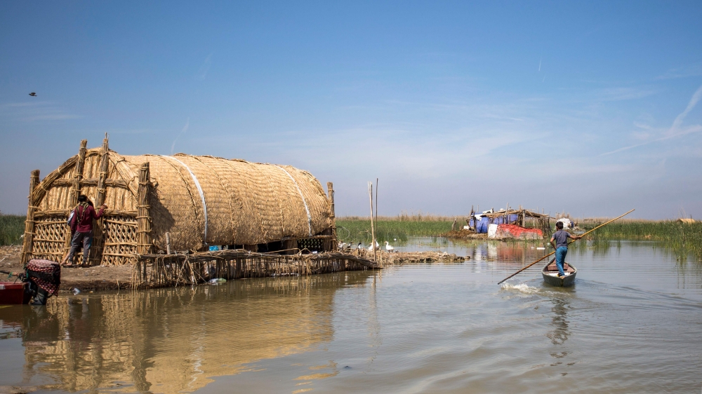 This picture taken on March 29, 2019 shows a floating palm reed-woven house for tourists in the marshes of the southern Iraqi district of Chibayish in Dhi Qar province, about 120 kilometres northwest of the southern city of Basra. AFP / Hussein Faleh
 