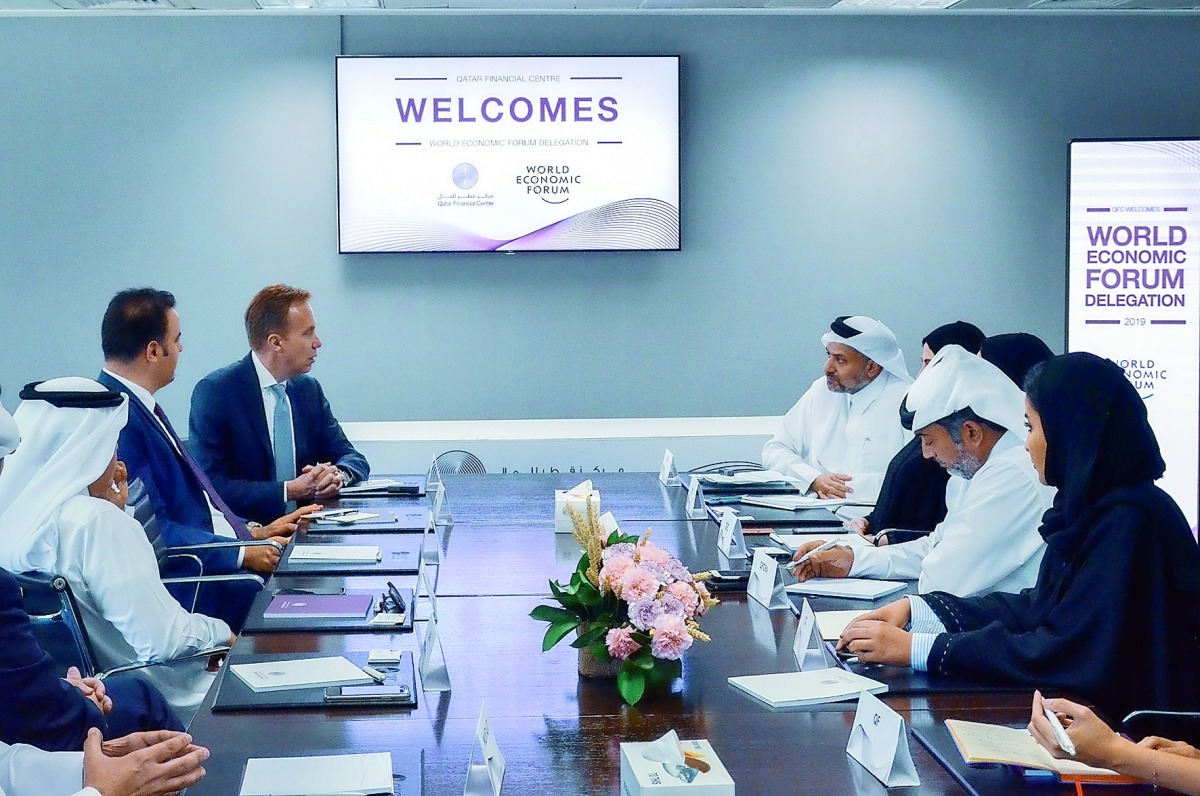 Borge Brende (third left), President of World Economic Forum (WEF ), and other delegates meeting with the Yousuf Mohamed Al Jaida (last on the right row), CEO of QFC, and other officials, yesterday. 