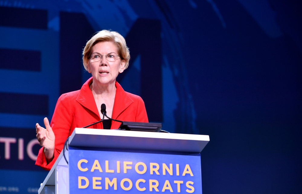 Democratic presidential candidate Elizabeth Warren speaks on stage during the 2019 California Democratic Party State Convention at Moscone Center in San Francisco on June 1, 2019. / AFP / Josh Edelson 