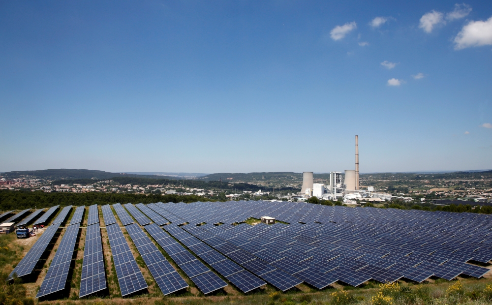 A general view shows solar panels to produce renewable energy at the Urbasolar photovoltaic park in Gardanne, France, June 25, 2018. Reuters/Jean-Paul Pelissier