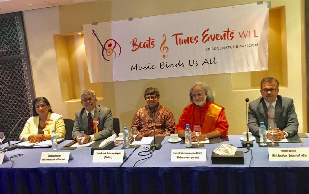 The musicians with the company officials.