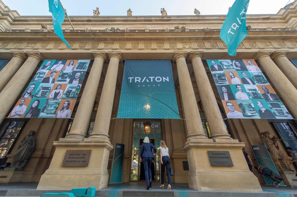Traton SE posters are fixed at the entrance to the stock exchange in Frankfrut am Main, western Germany, where took place the launch of the company's initial public offer on June 28, 2019.  AFP / DPA / Boris Roessler 