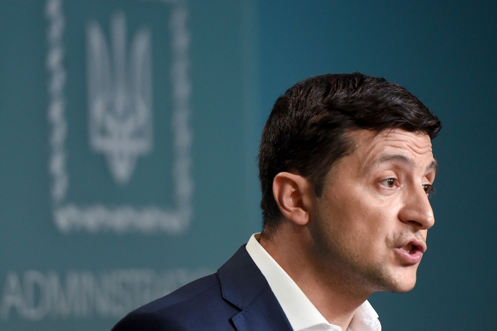 Ukrainian President Volodymyr Zelensky speaks during a press briefing in Kiev on June 27, 2019. AFP / Sergei Supinsky 