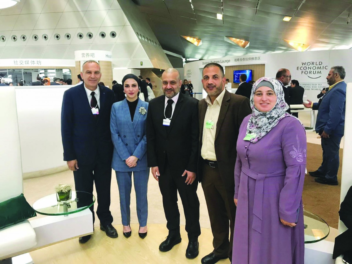 Yousuf Mohamed Al Jaida (centre), CEO, QFC Authority; and Sheikha Alanoud bint Hamad Al Thani (second left), Managing Director, Business Development, QFC Authority, with delegates during the World Economic Forum’s Annual Meeting of the New Champions.