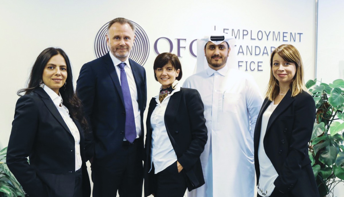 Luigia Ingianni (centre), Commissioner, Employment Standards Office at QFC, with the ESO Team.