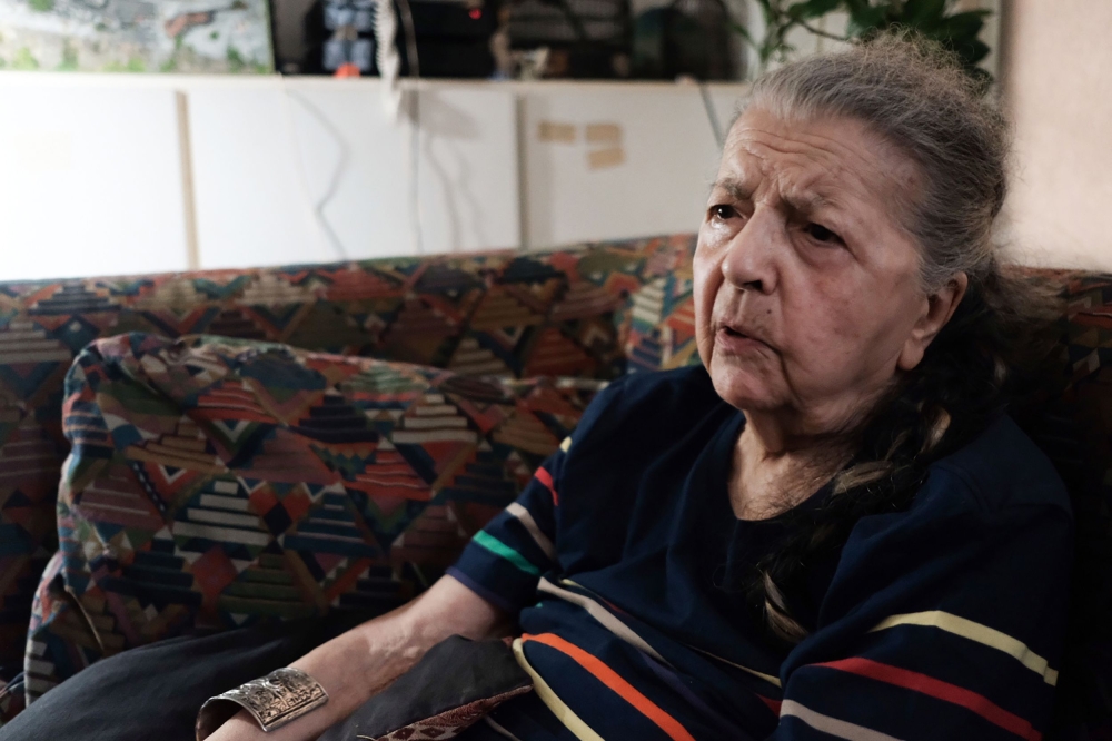 Madeleine Riffaud, 94, speaks about the liberation of Paris on 1944 during an interview with the AFP at her appartment in Paris, on July 26, 2019.  / AFP / Natalie HANDEL