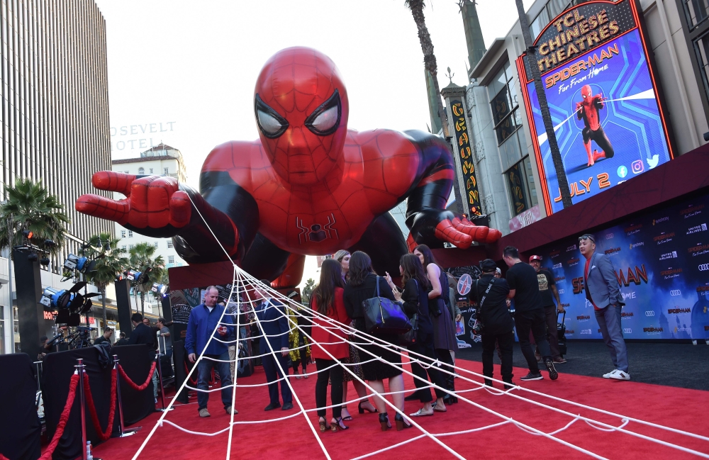 (FILES) In this file photo taken on June 26, 2019, a giant inflatable Spider-Man is displayed on the red carpet for the