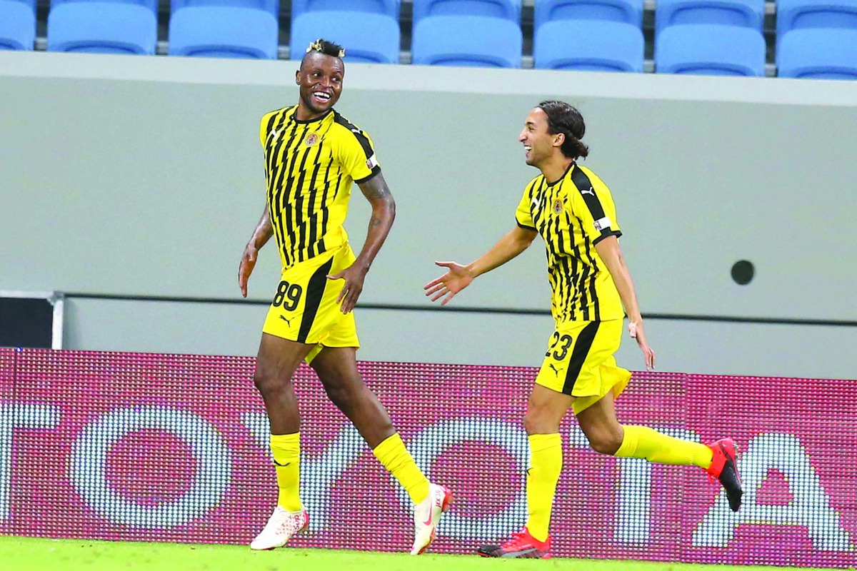 The players of Qatar Sports Club celebrate after scoring a goal against Al Duhail in the  QNB Stars League match at Al Janoub Stadium yesterday.