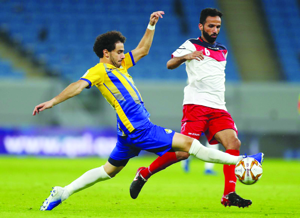 Al Gharafa’s Ahmed Alaaeldin (left) in action against Al Shahania captain Mostafa Jalal Jafri during their opening match of the QNB Stars League at Al Janoub Stadium yesterday. Picture: Twitter/ 
@alkasschannel 