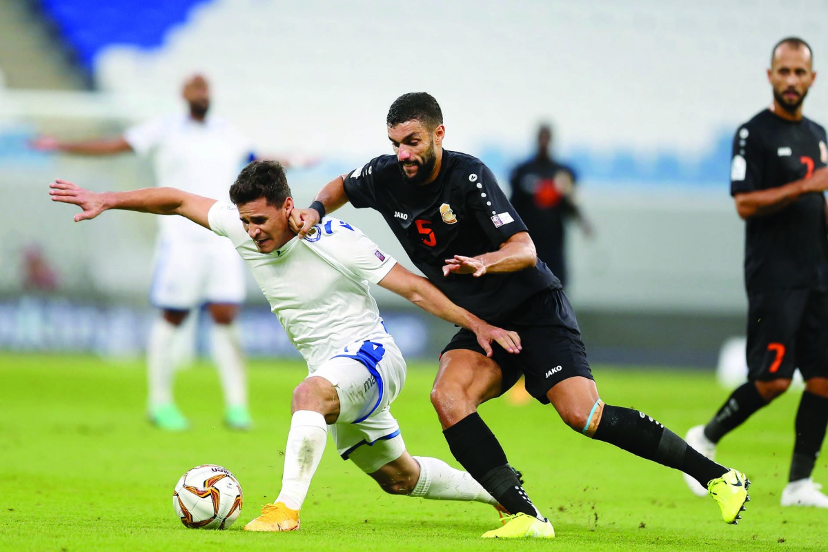 Al Khor and Umm Salal players vie for the ball during yesterday’s match at Al Janoub Stadium. Pic: Mohamed Farag