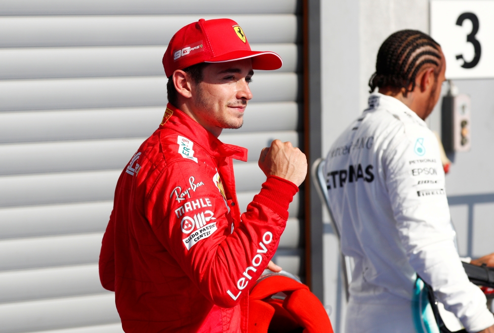 Ferrari's Charles Leclerc celebrates after qualifying in pole position REUTERS/Francois Lenoir