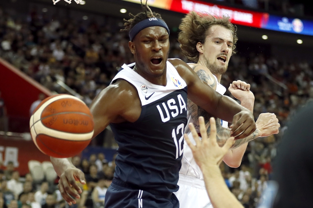 Myles Turner of the U.S. in action with Czech Republic's Ondrej Balvin REUTERS/Aly Song