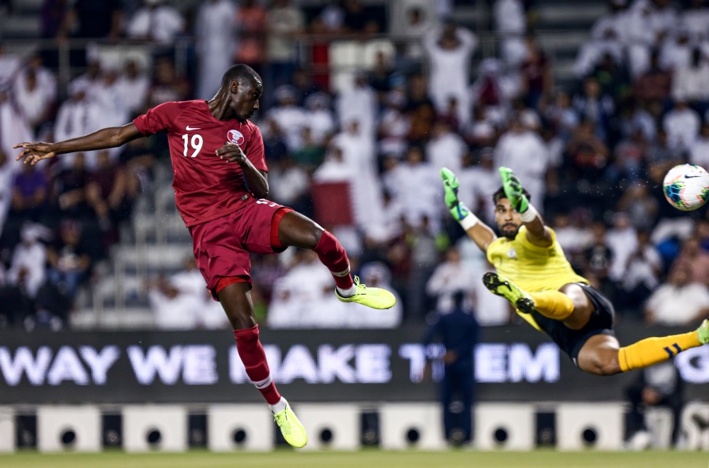Qatar's forward Almoez Ali scores a goal during the second round Group E qualification football match for the 2022 Qatar FIFA World Cup between Qatar and Afghanistan at the Jassim bni Hamad Stadium in Doha on September 5, 2019. AFP