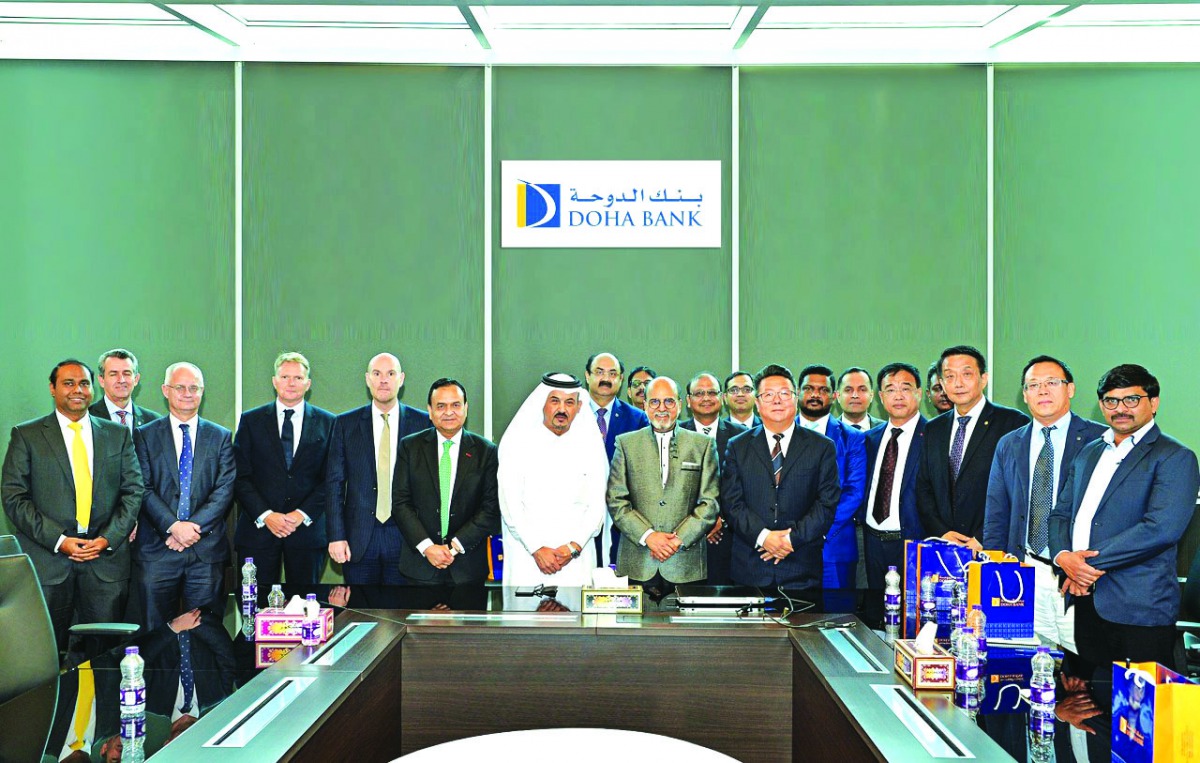 Doha Bank CEO Dr R Seetharaman and other officials with Chinese delegation members, during the event.