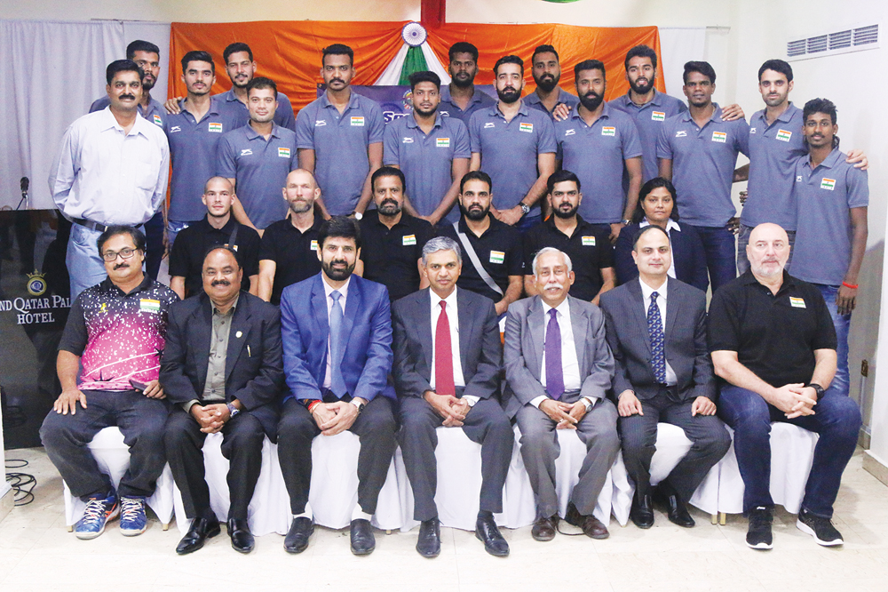 Indian Volleyball team players, coaches and officials with Ambassador of India, P Kumaran (centre), President of  Indian Sports Centre, Nilangshu Dey (third right), and other officials.