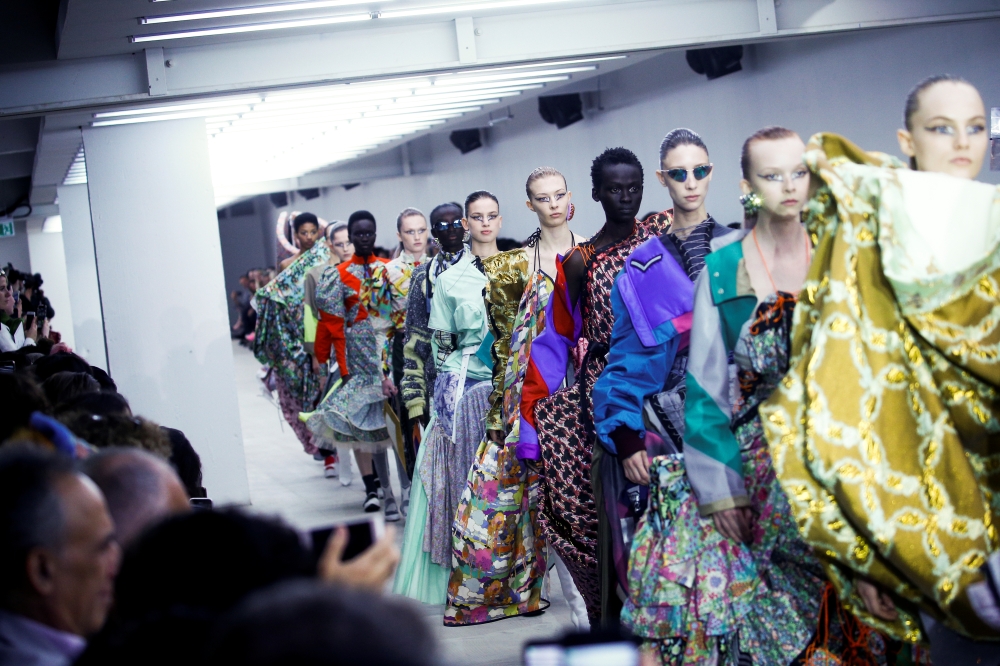 Models present creations during the Matty Bovan catwalk show during London Fashion Week in London, Britain, September 13, 2019. Reuters/ Henry Nicholls