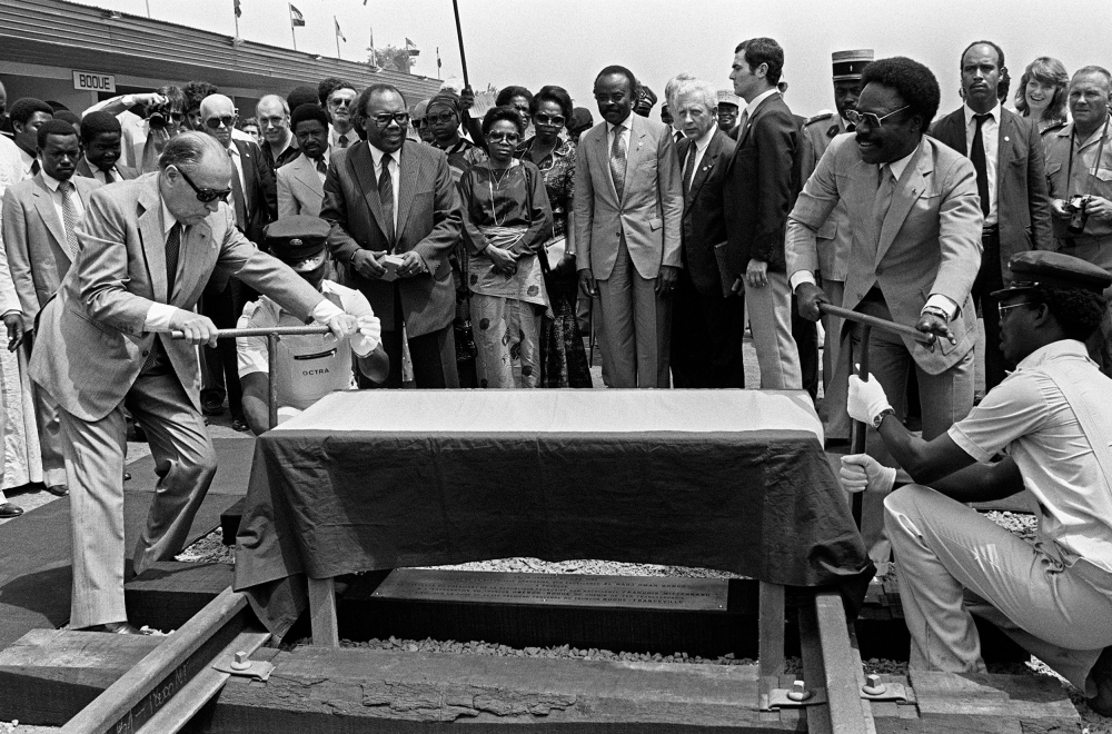 Then French President Francois Mitterrand (L) with Gabon President Omar Bongo inaugurates the second section of the Trans-Gabon Railway (Transgabonais) in Franceville on January 18, 1983. AFP / Daniel Janin
 

