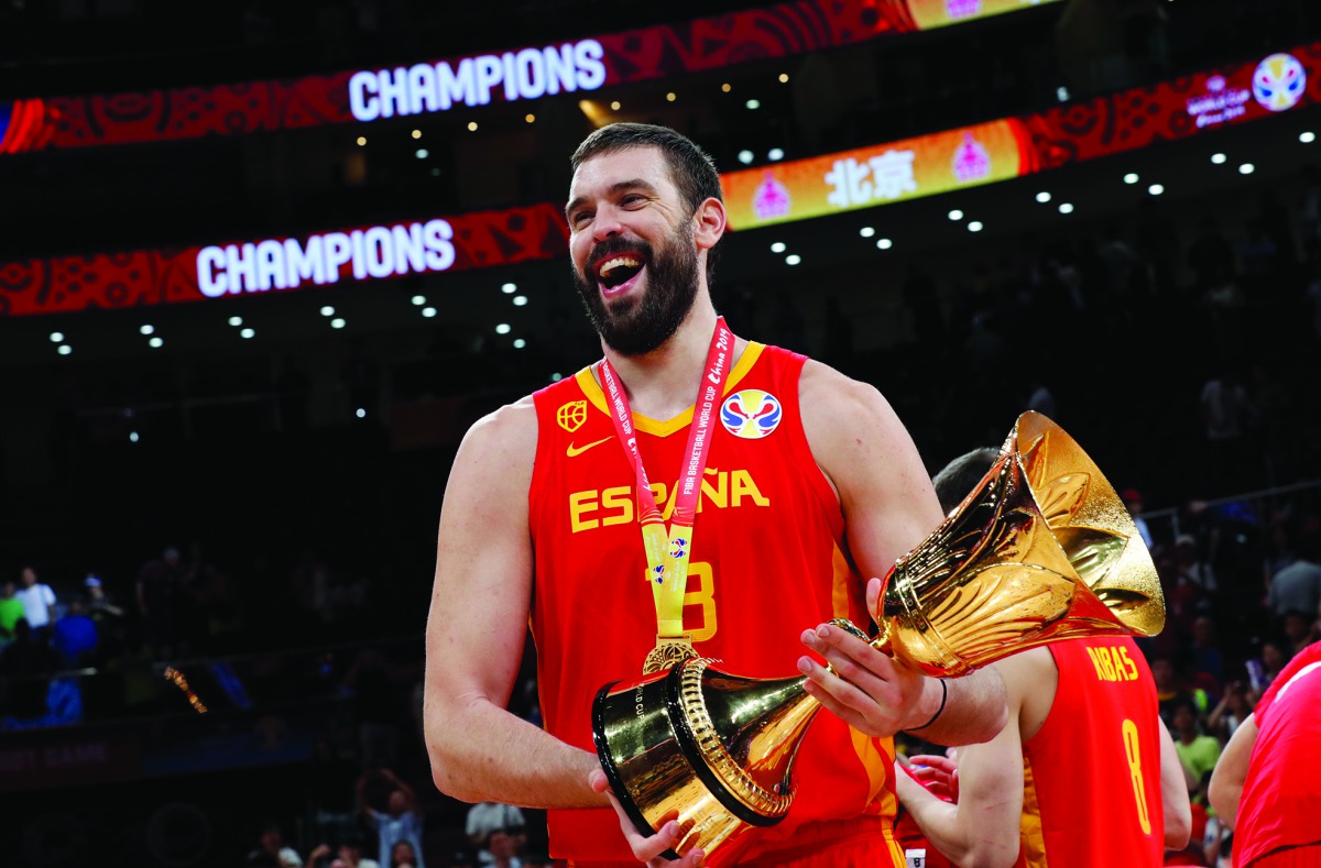 Spain's Marc Gasol celebrates with the trophy after winning the FIBA World Cup. Reuters/Kim Kyung-Hoon
