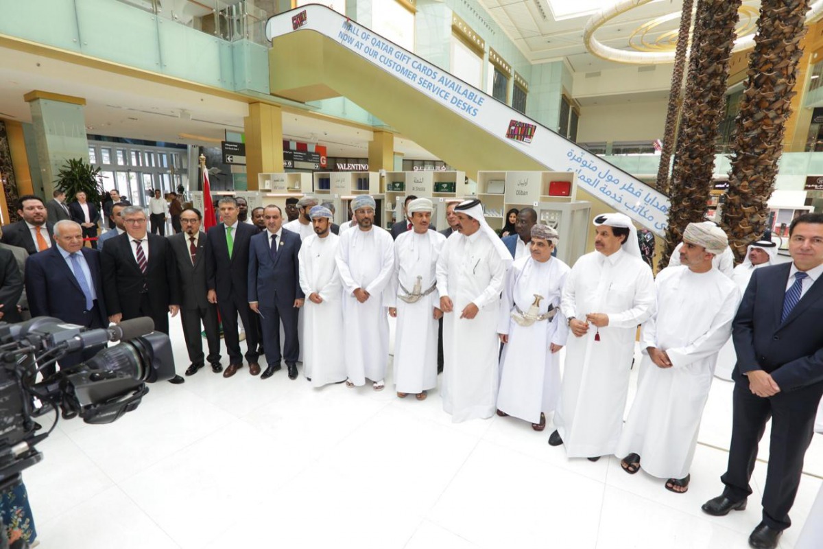 Top diplomats and senior officials from Qatar Chamber are posing for a group photo with Omani officials along with the representatives of Omani creative Small and Mid-sized enterprises at the Mall of Qatar, yestrday. The Omani firms are shocasing thier pr