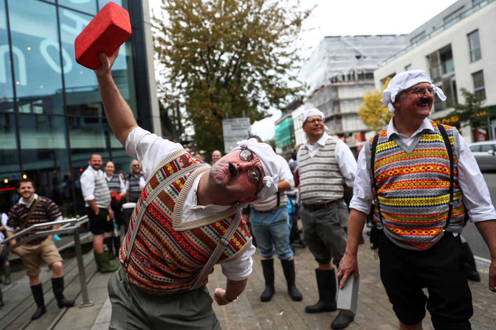 Monty Python fans dressed as the Gumbys gather in an attempt to set the world record for the largest gathering of people dressed as Gumbys as a part of the 50th anniversary of Monty Python's Flying Circus at the Roundhouse in London, Britain October 5, 20