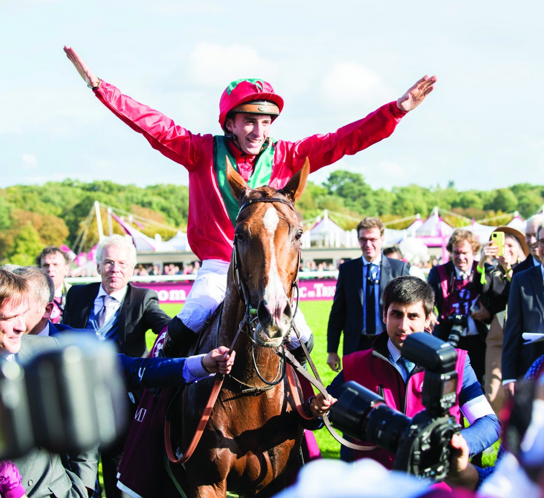 Jockey Pierre-Charles Boudot celebrates after Waldgeist won the Gr 1 Qatar Prix de l’Arc de Triomphe yesterday.